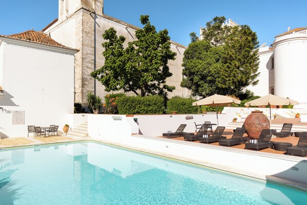 Outdoor pool, pool umbrellas, pool loungers