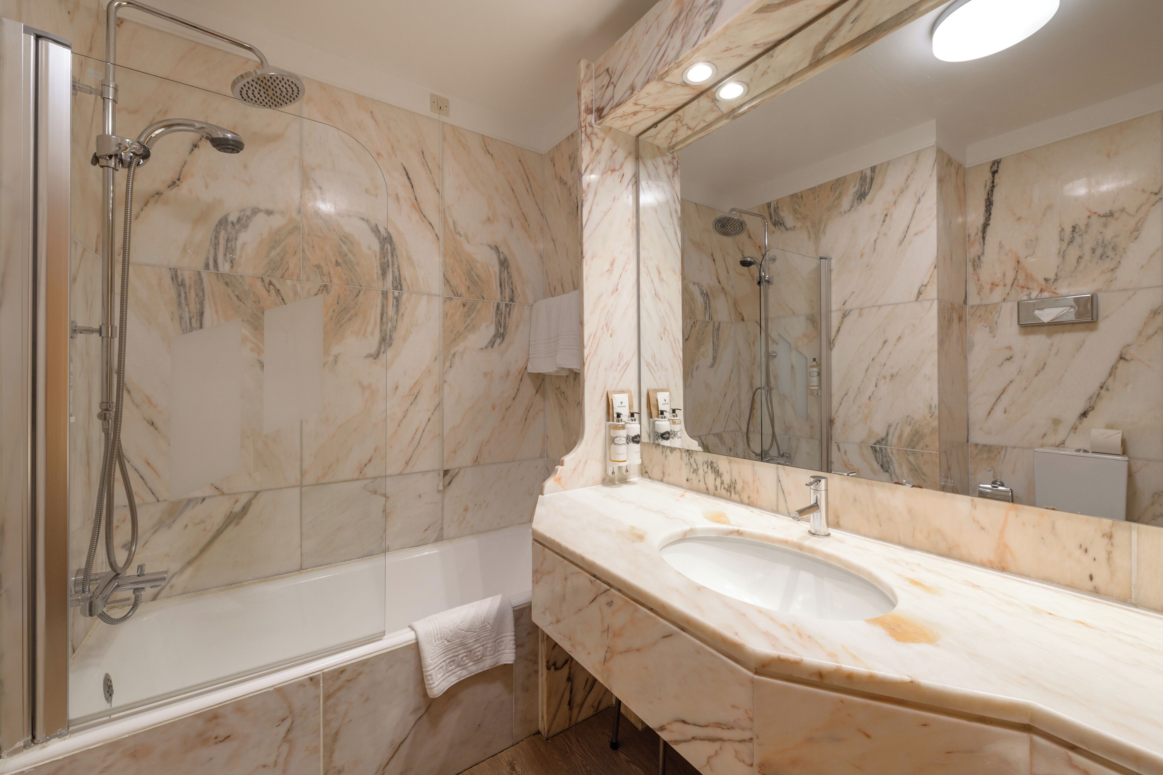 family room (standard) | bathroom | combined shower/bathtub, eco-friendly toiletries, hair dryer, bidet