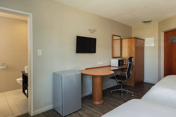 Room, 2 Double Beds, Garden View | Minibar, in-room safe, desk, iron/ironing board