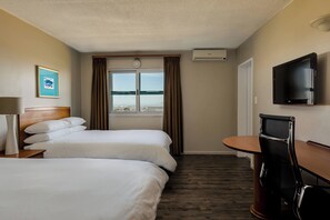 Room, 2 Double Beds | Minibar, in-room safe, desk, iron/ironing board