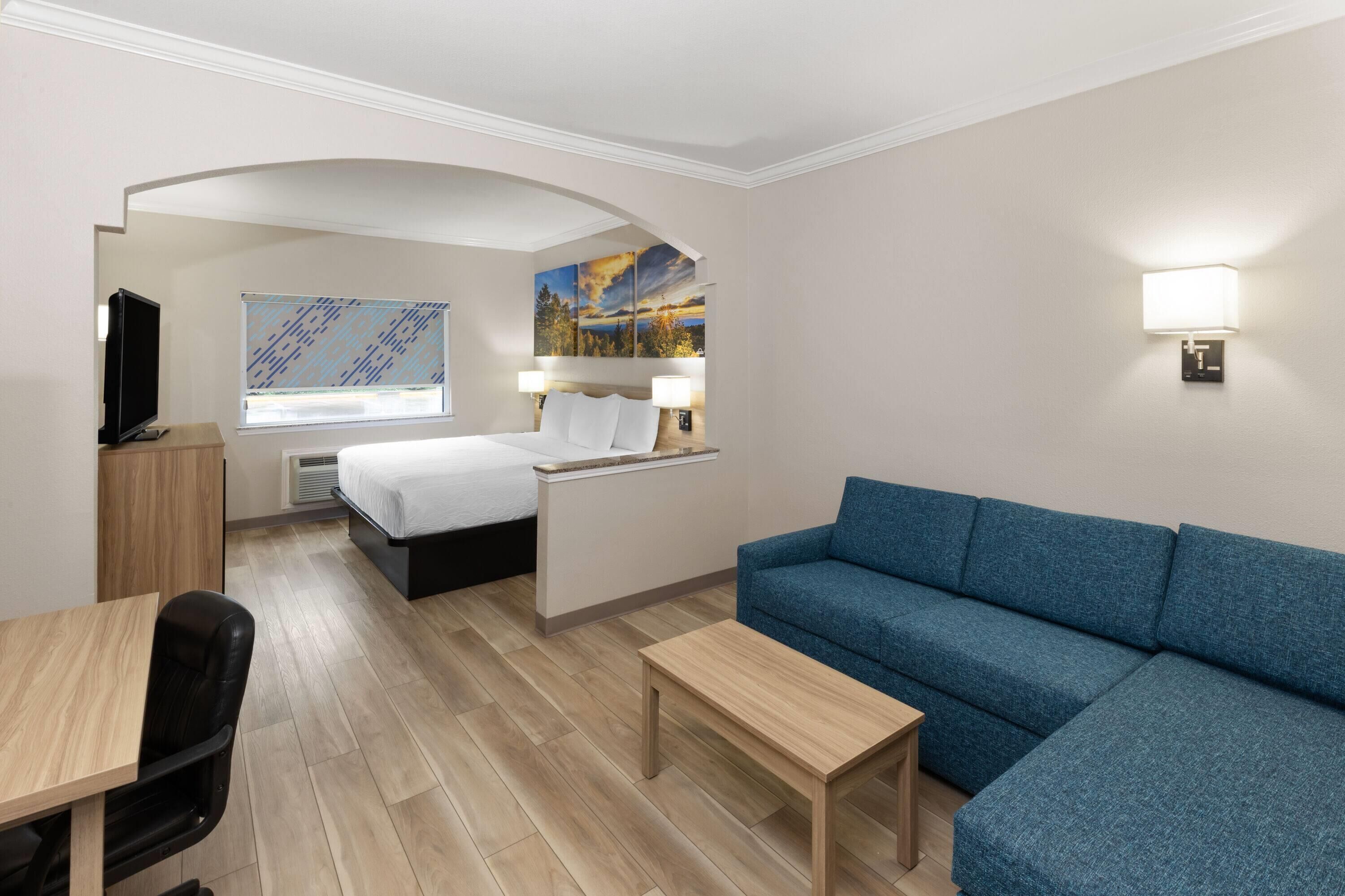 suite, 1 king bed, accessible, non smoking (mobility, tub w/grab bars) | in-room safe, desk, laptop workspace, blackout curtains