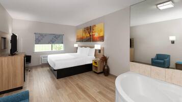 Chambre Deluxe, 1 très grand lit, non-fumeurs | Baignoire à jets