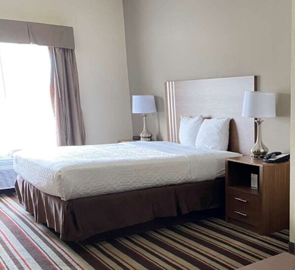 Standard Room, 1 King Bed, Non Smoking, Refrigerator & Microwave (Larger Room) | In-room safe, desk, iron/ironing board, free cribs/infant beds