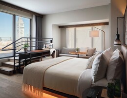 Premium bedding, down comforters, pillowtop beds, minibar