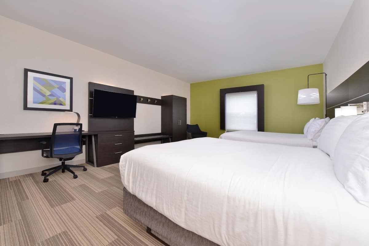 Desk, iron/ironing board, cribs (free), WiFi (free)