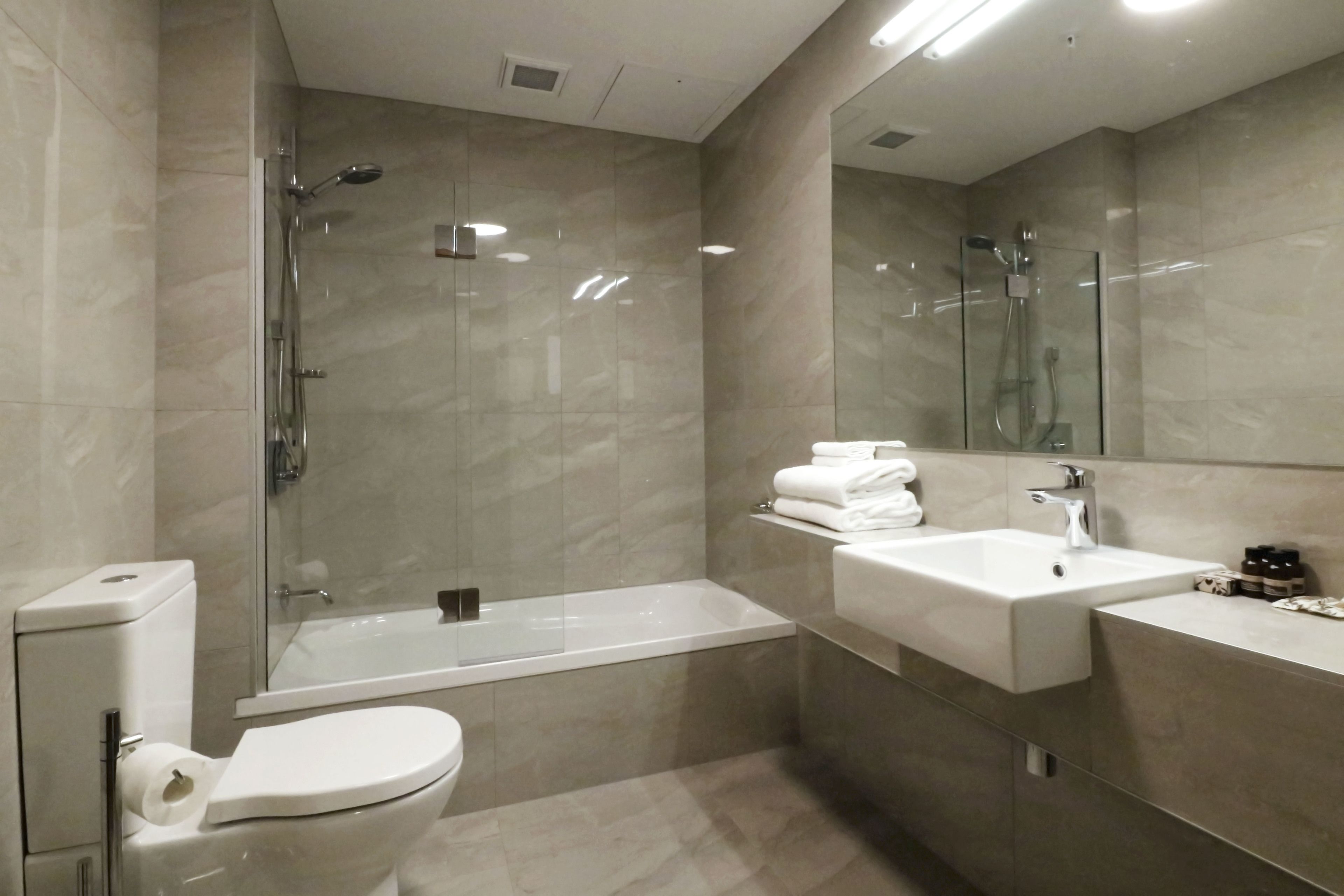 superior room | bathroom | shower, free toiletries, hair dryer, towels