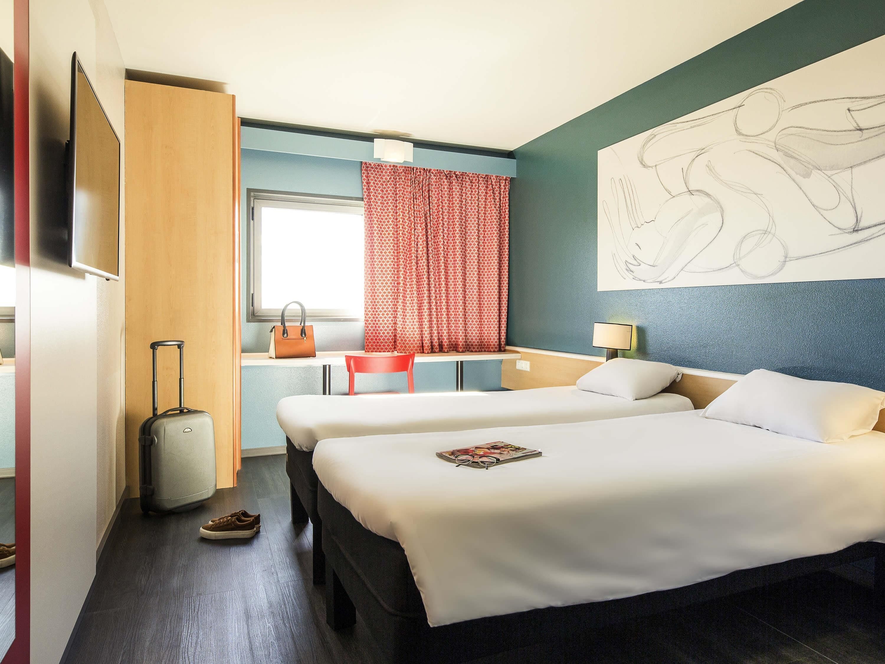 Twin Room, 2 Twin Beds | Down comforters, individually decorated, individually furnished