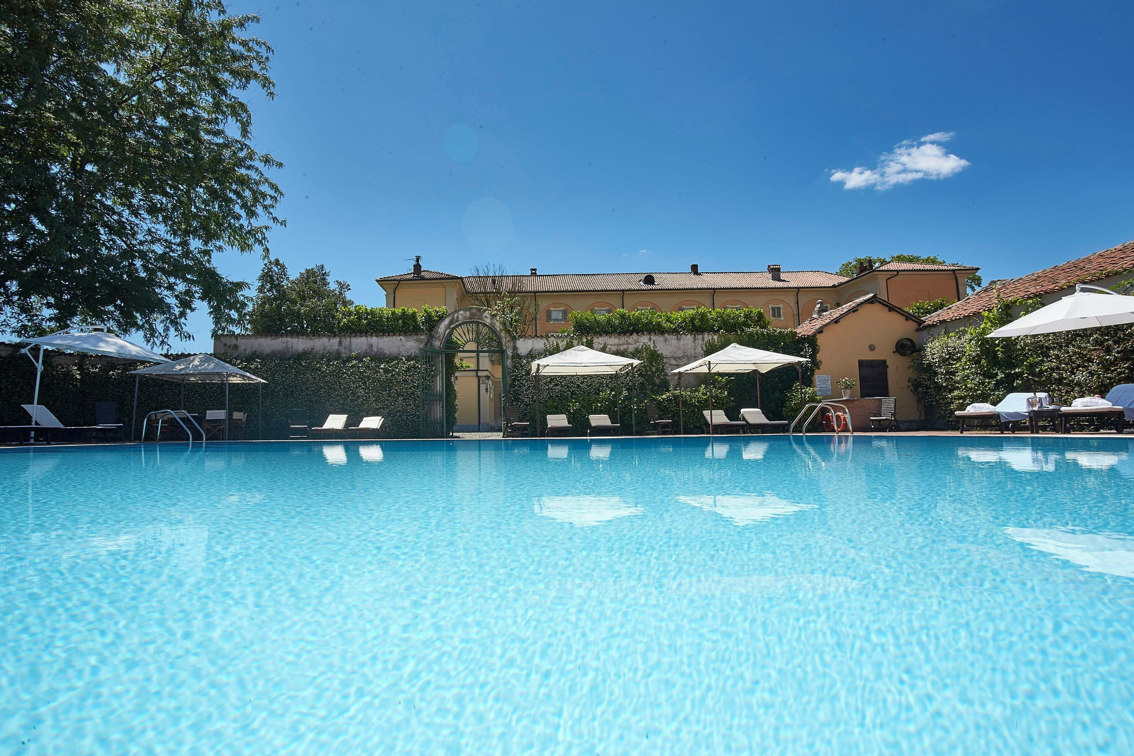 Seasonal outdoor pool, pool umbrellas, sun loungers