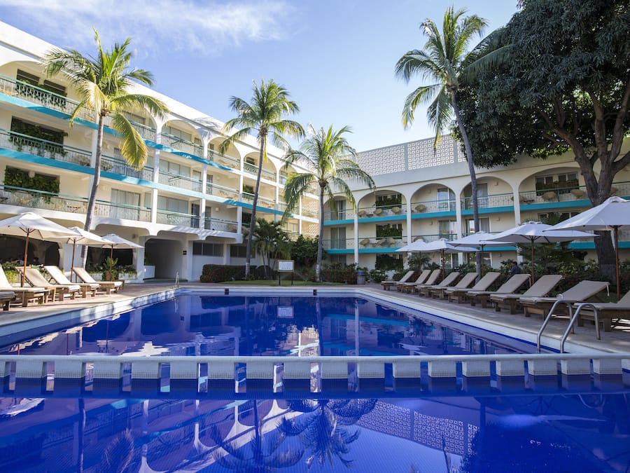 Outdoor pool, open 8:00 AM to 9:00 PM, pool umbrellas, sun loungers