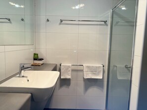 Shower, free toiletries, hair dryer, towels