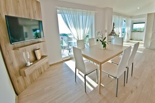 Panoramic Apartment, Sea View | Minibar, blackout drapes, iron/ironing board, free WiFi