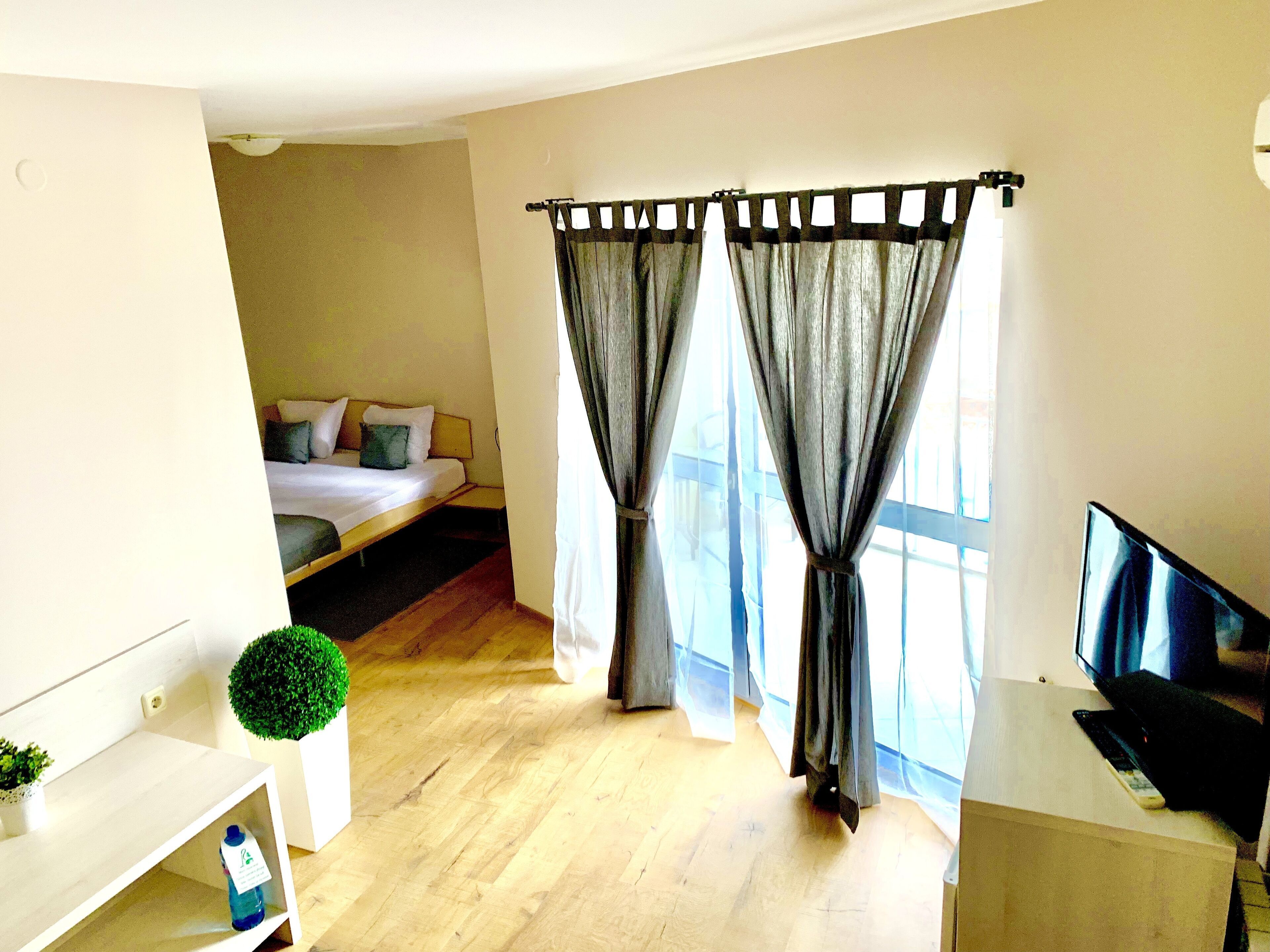 Minibar, blackout curtains, soundproofing, iron/ironing board