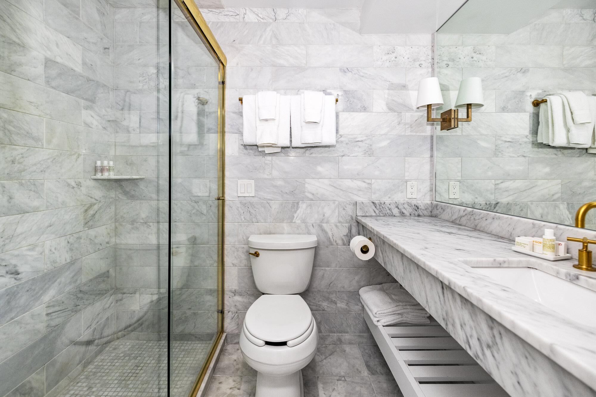 Combined shower/tub, designer toiletries, hair dryer, bathrobes