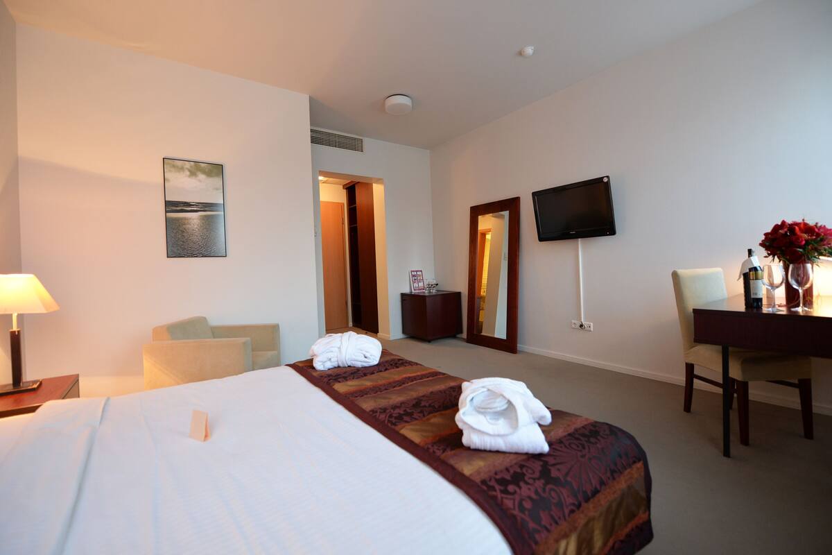 Blackout drapes, iron/ironing board