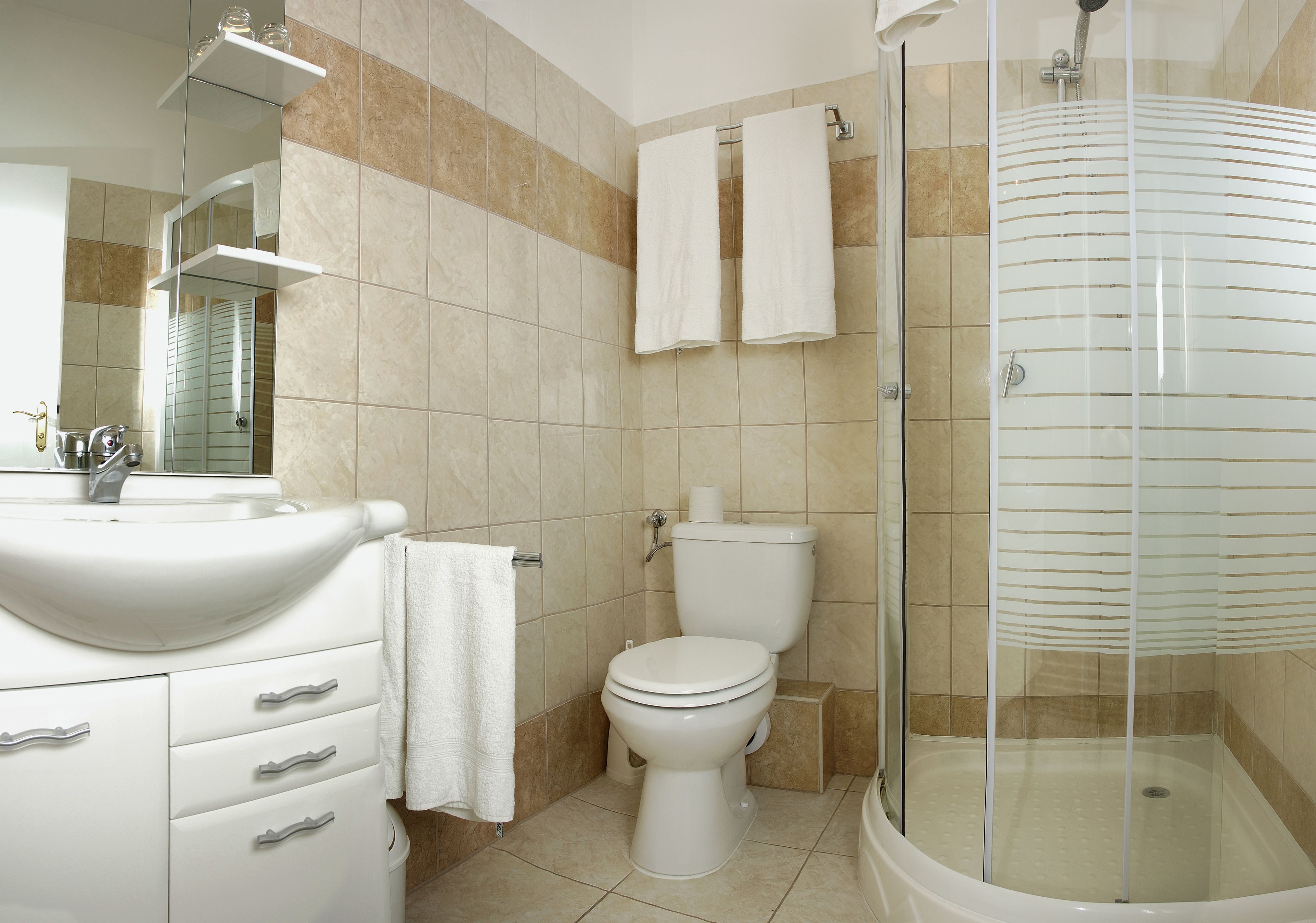 eco-friendly toiletries, hair dryer, towels