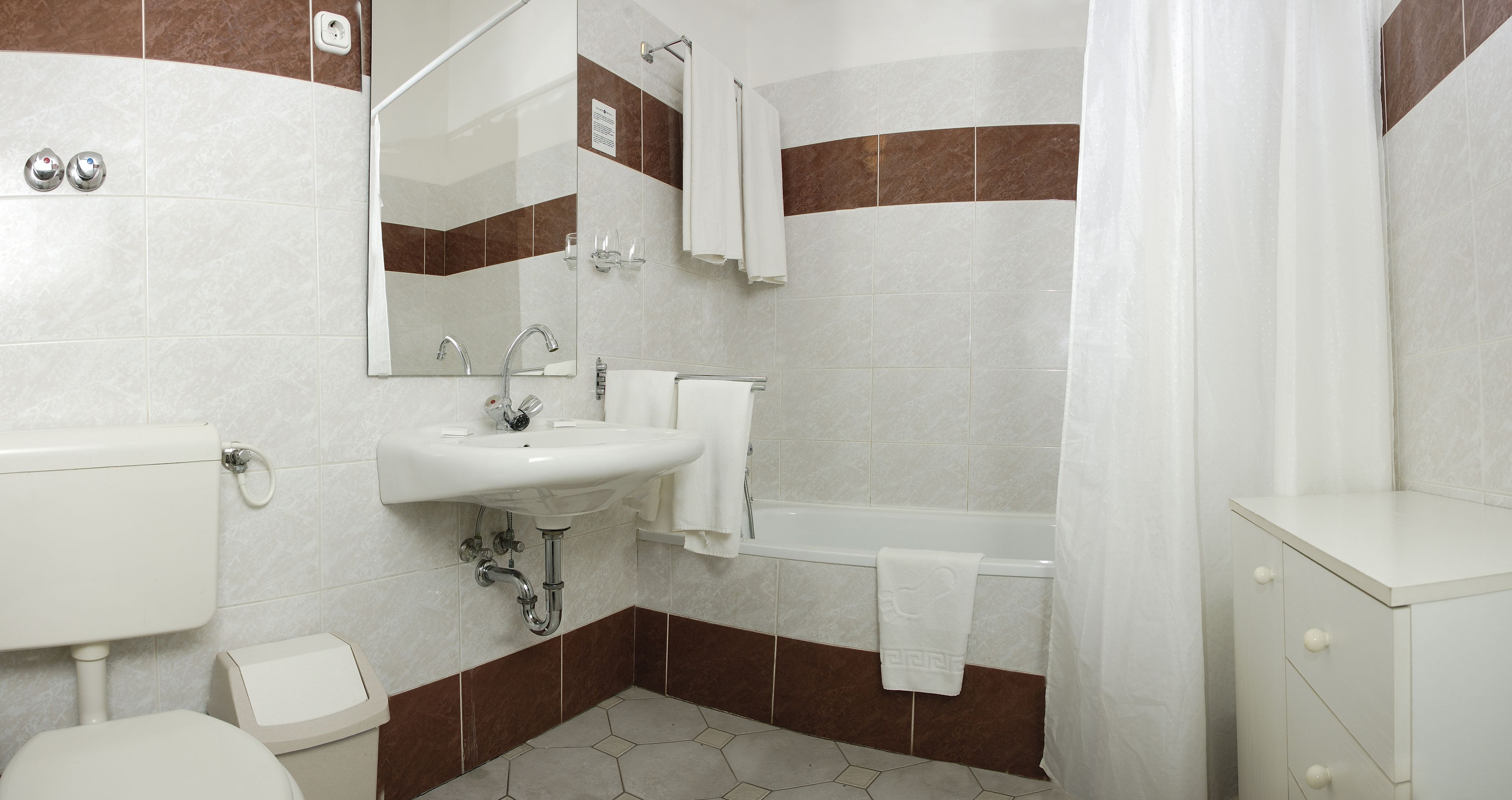 eco-friendly toiletries, hair dryer, towels