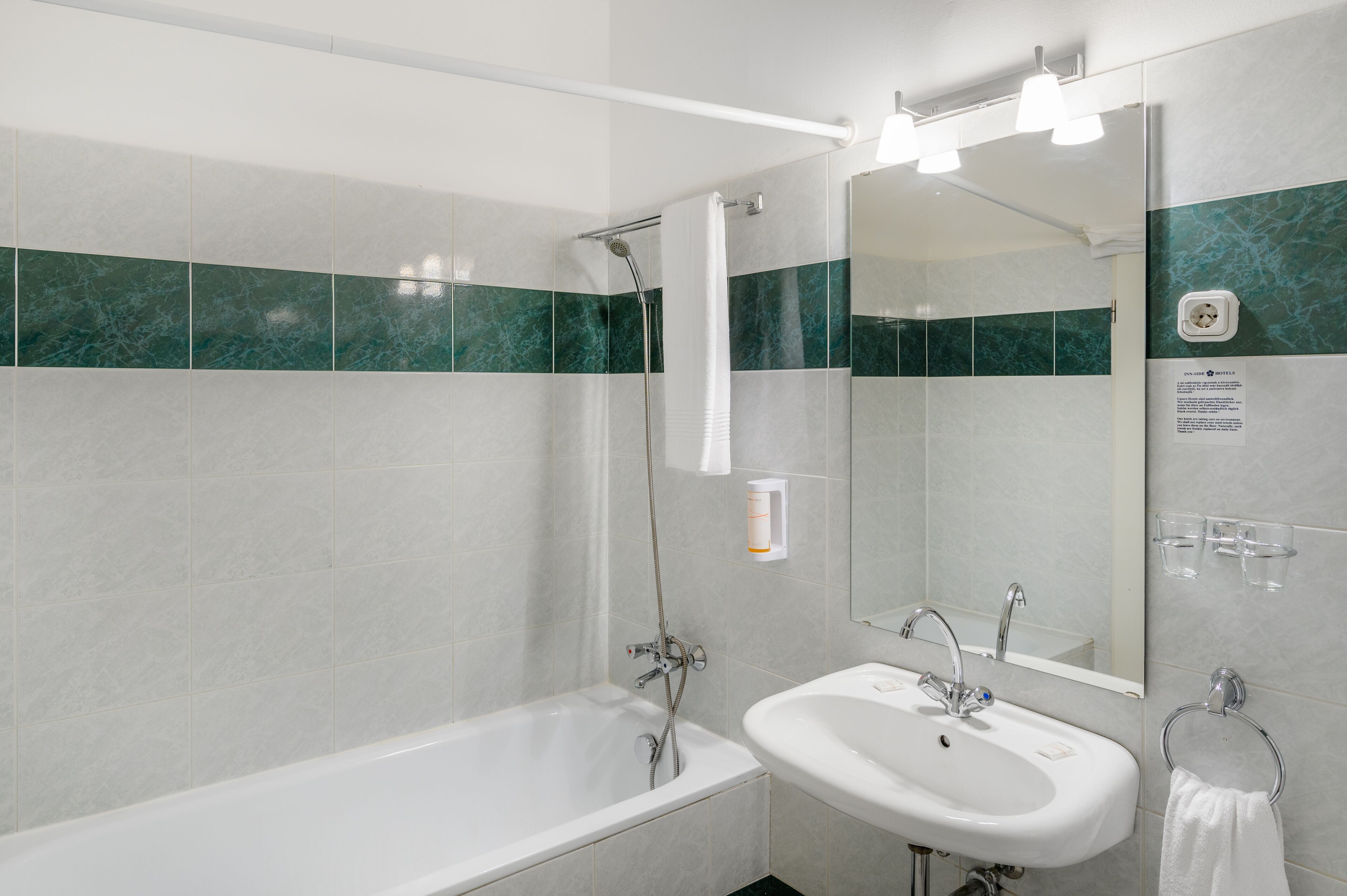 eco-friendly toiletries, hair dryer, towels