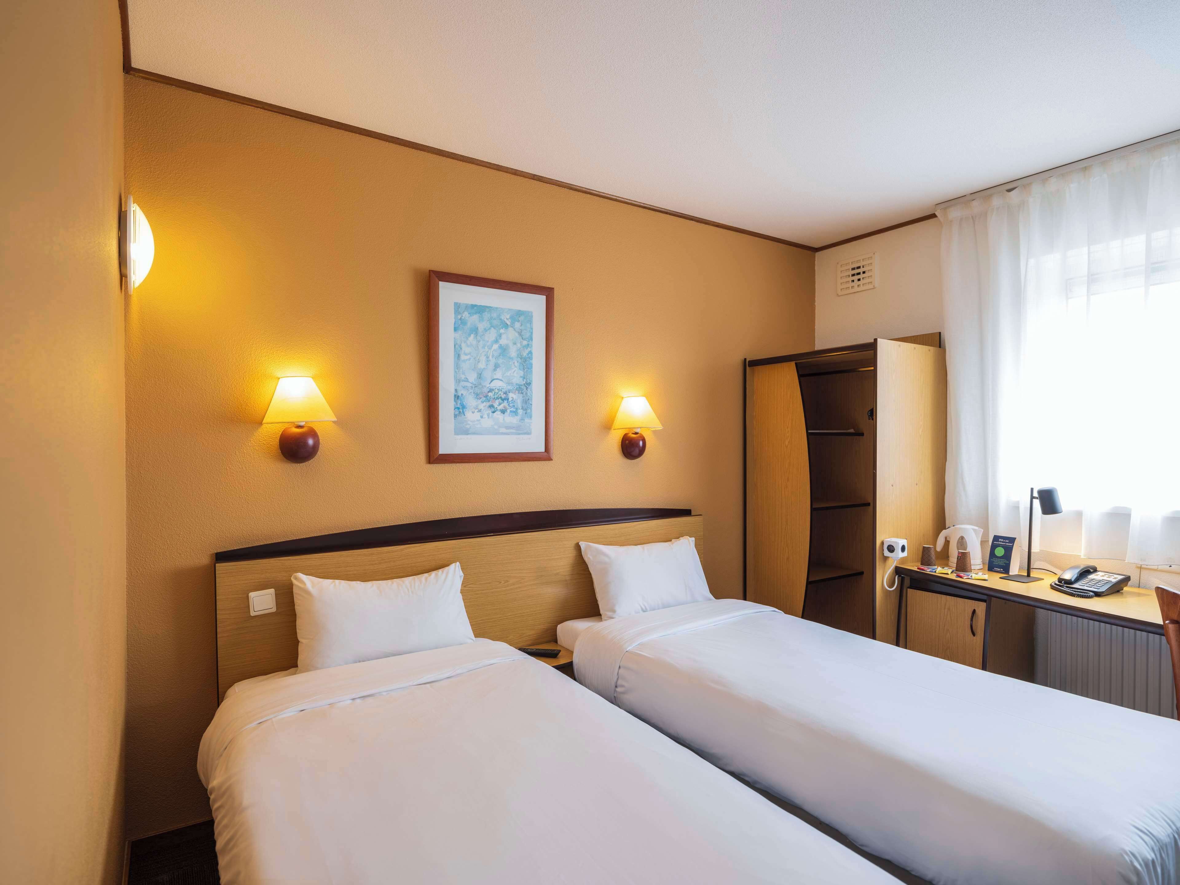 Desk, blackout drapes, iron/ironing board, free WiFi
