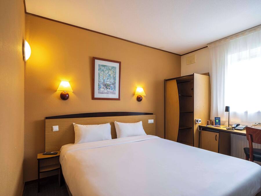 Desk, blackout curtains, iron/ironing board (on request), free WiFi