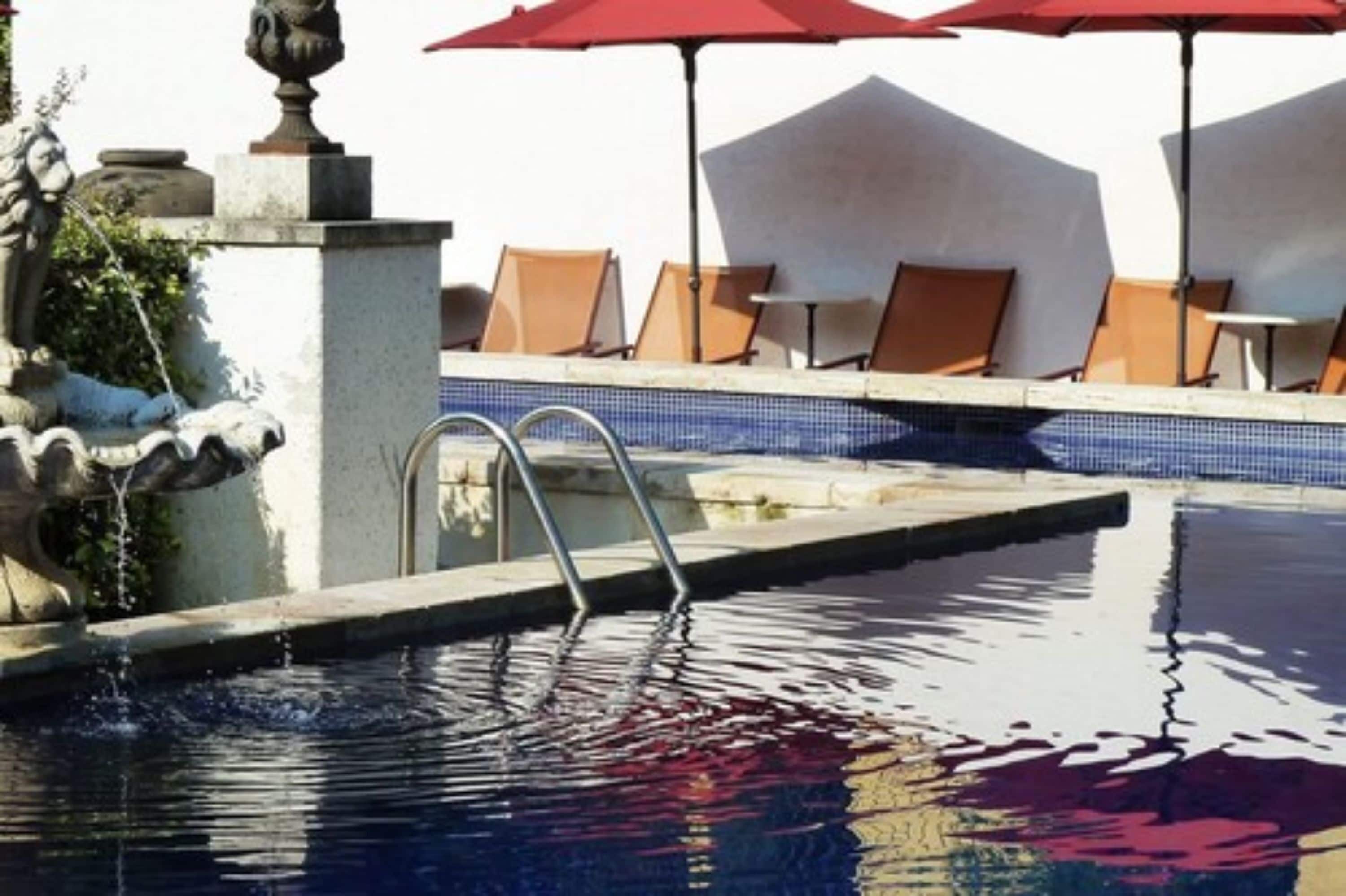seasonal outdoor pool, pool umbrellas, pool loungers