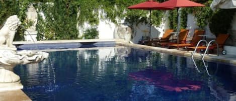 Seasonal outdoor pool, pool umbrellas, pool loungers