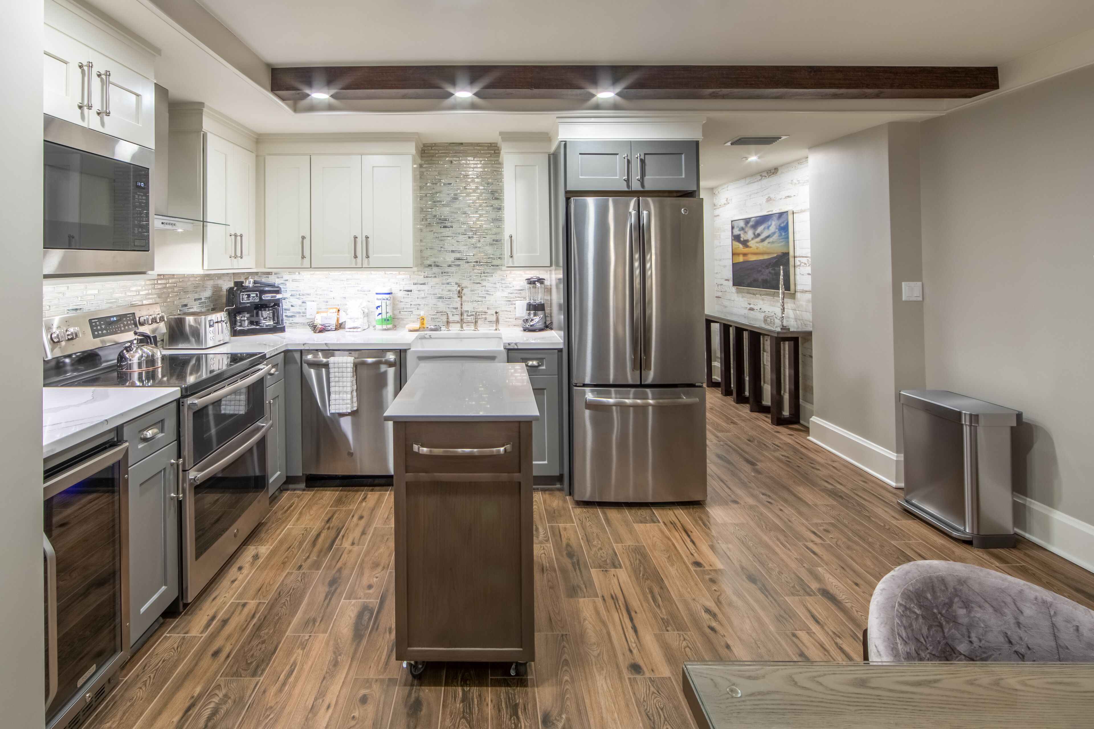 microwave, coffee/tea maker, toaster, dining tables