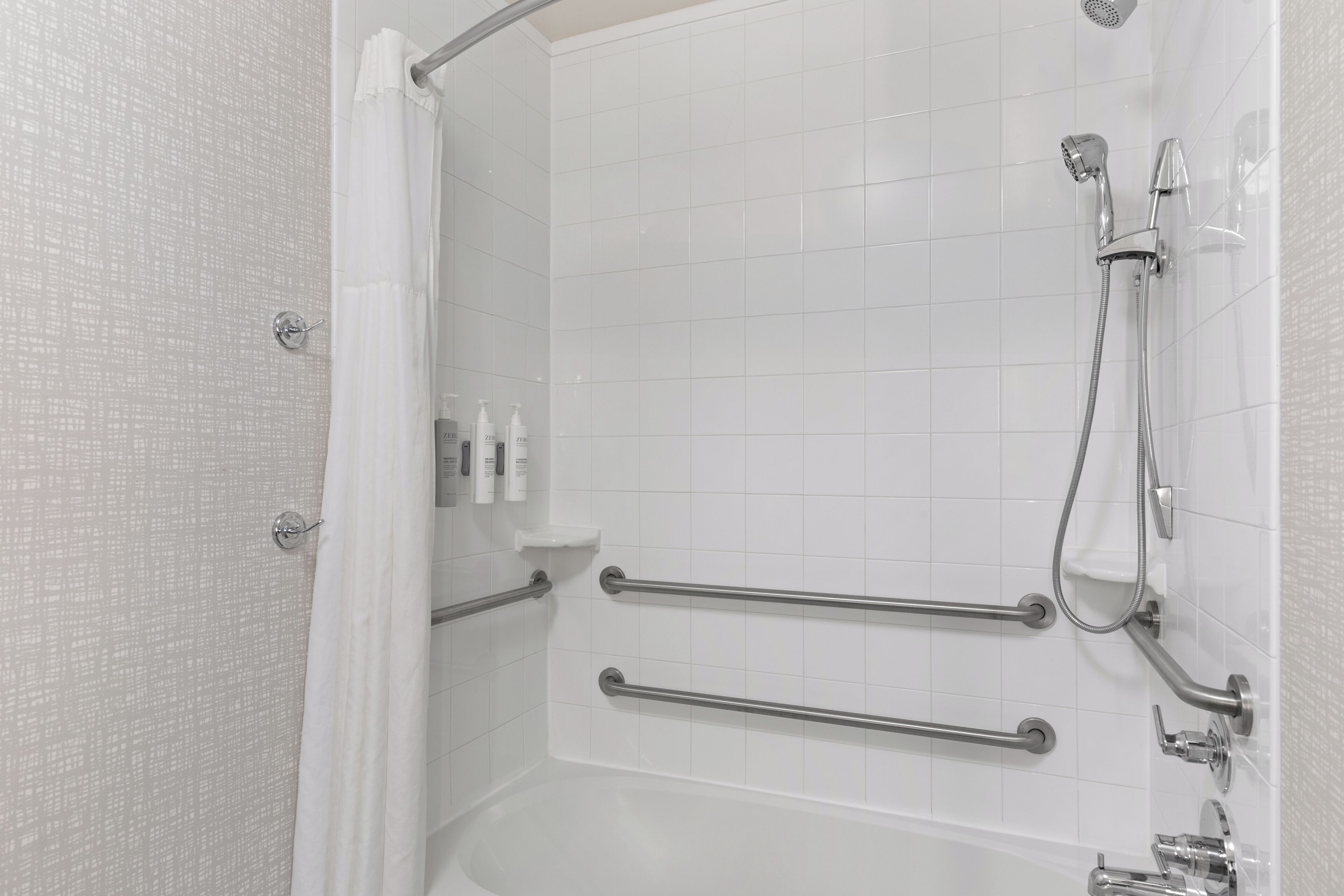 combined shower/bathtub, free toiletries, hair dryer, towels
