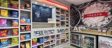 A snack display area with various chips and snacks.