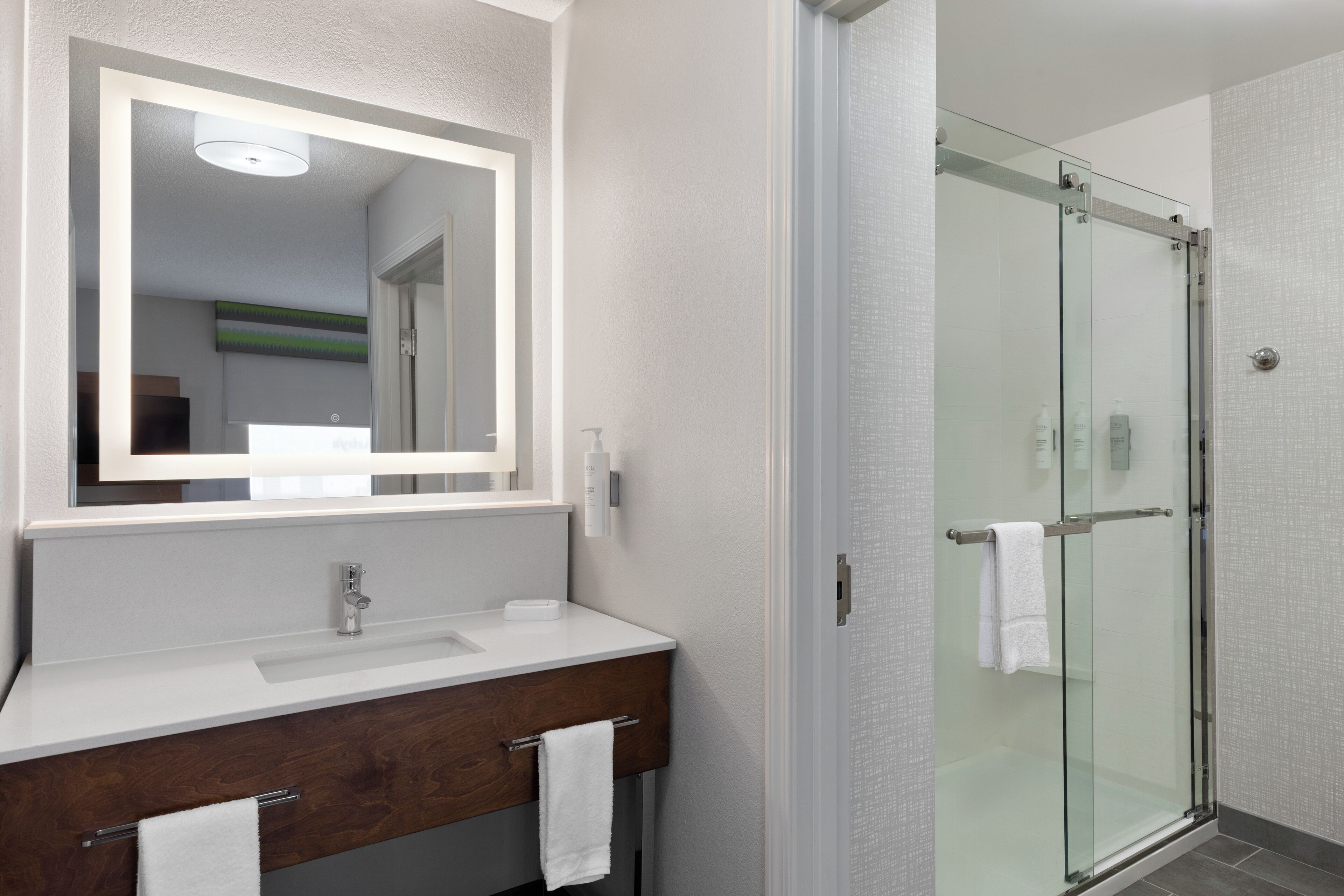 combined shower/bathtub, free toiletries, hair dryer, towels