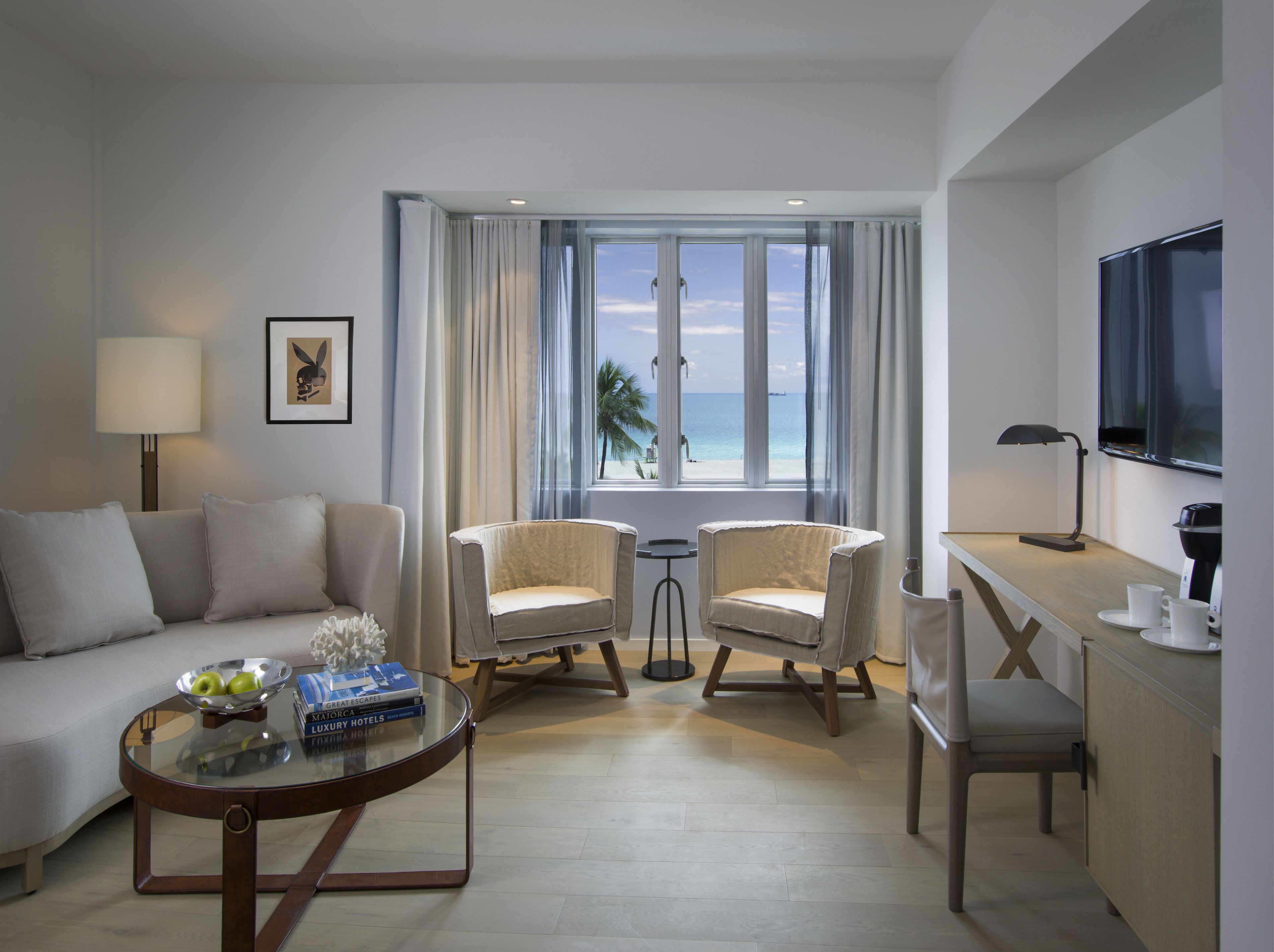 king suite | living area | 46-inch flat-screen tv with satellite channels, smart tv, ipod dock