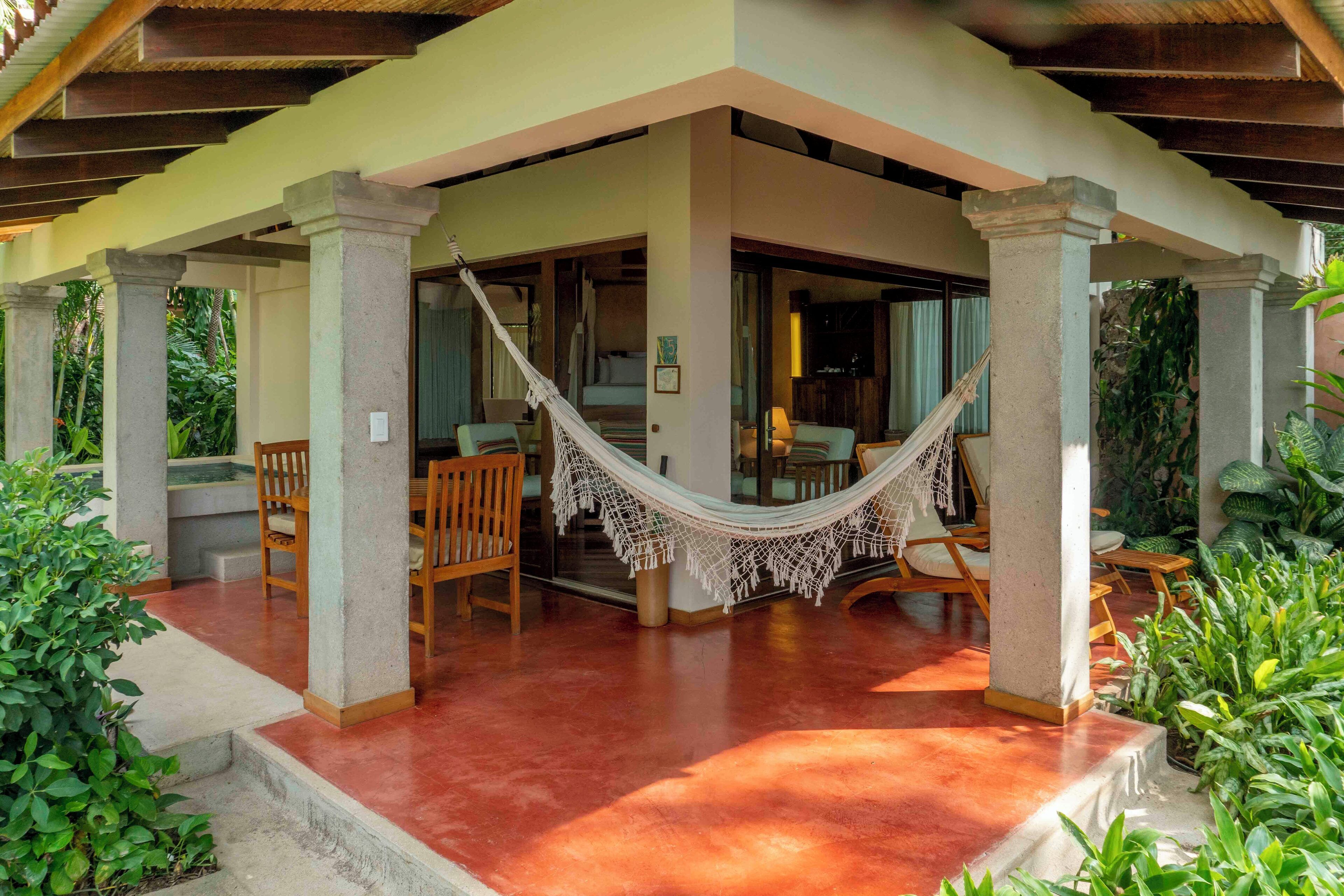 Beachfront Bungalow | Down duvets, pillow-top beds, in-room safe, desk