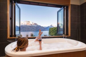 Luxury Double Villa, 1 Bedroom, Jetted Tub, Lake View | Bathroom | Separate tub and shower, rainfall showerhead, hair dryer, bathrobes