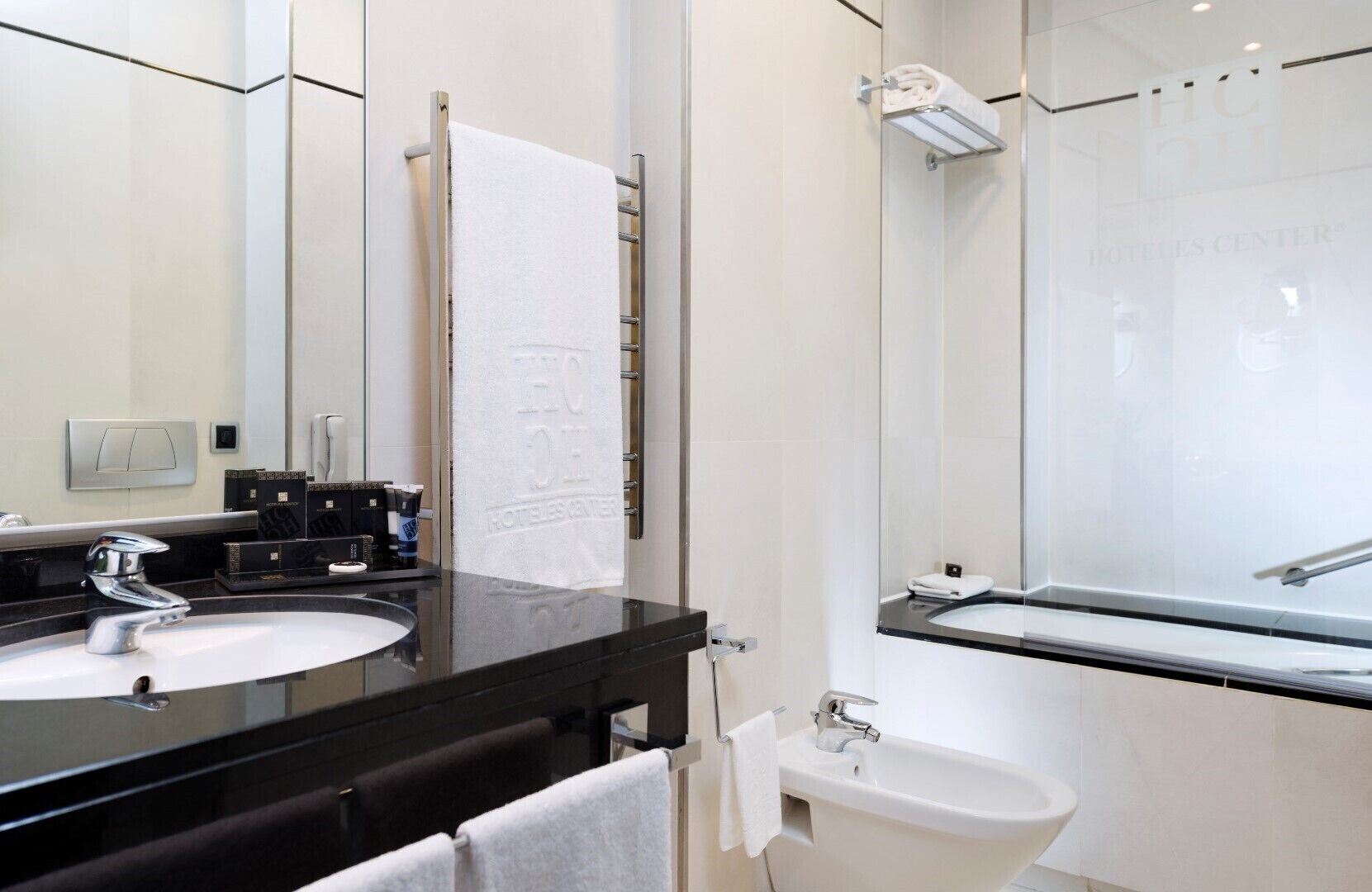 free toiletries, hair dryer, bidet, towels