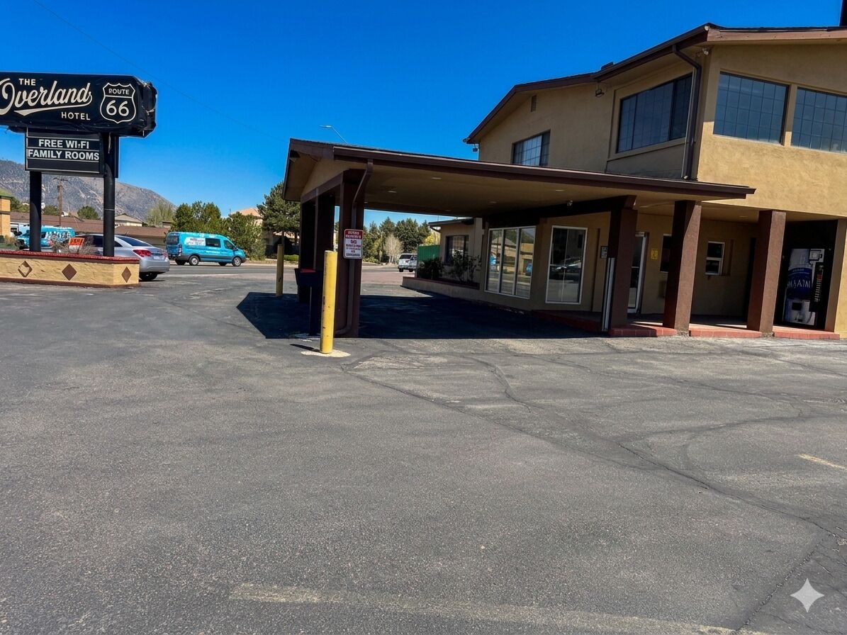 The Overland Hotel with a covered entrance, free Wi-Fi, and family rooms.