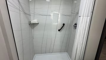 Shower, hydromassage showerhead, designer toiletries, hair dryer