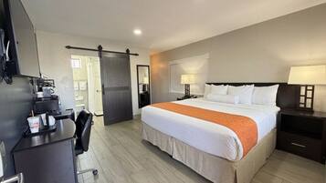 Deluxe kamer (Accessible King) | Luxe beddengoed, verduisterende gordijnen, gratis wifi, beddengoed