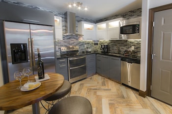 Full-size fridge, microwave, oven, stovetop at Holiday Inn Club Vacations at Desert Club Resort by IHG