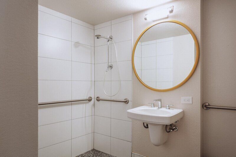 Room, 1 King Bed, Accessible (Tradewind) | Bathroom | Shower, free toiletries, hair dryer, bathrobes