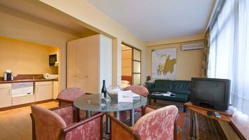 Apartment, 1 Bedroom | Living room | TV