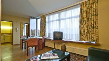 Apartment, 1 Bedroom | Living room | TV