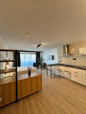 Studio Deluxe | Coffres-forts dans les chambres, fer et planche à repasser