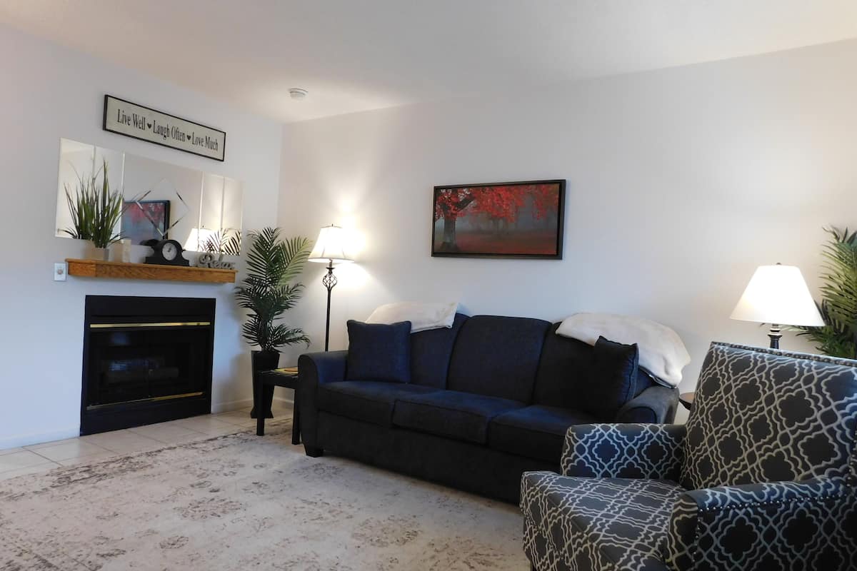 Condo, 1 Bedroom (206) | Living area | TV, fireplace