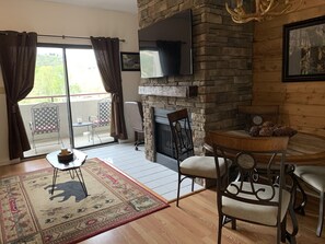 Condo, 2 Bedrooms (602) | Living area | TV, fireplace - Laurel Inn Condominium (Gatlinburg)