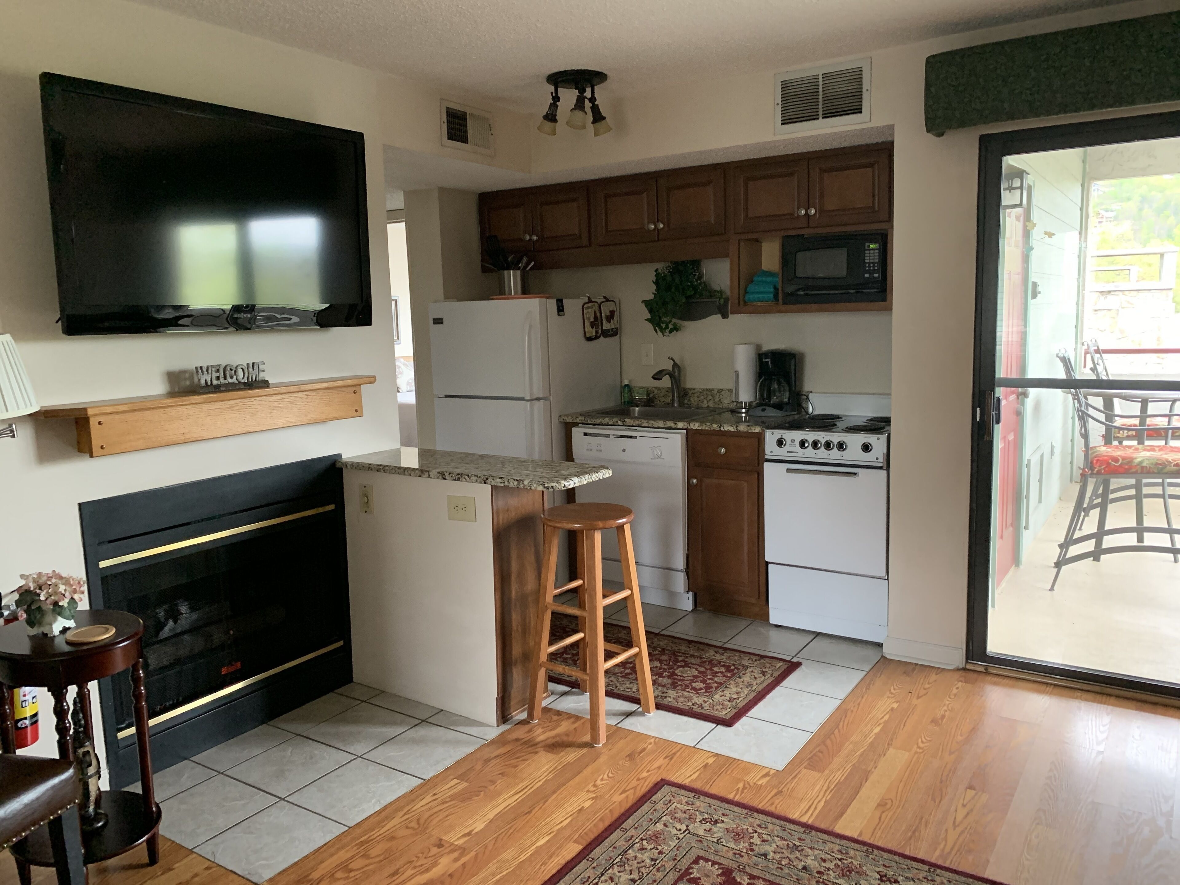 condo, 2 bedrooms (501) | living area | tv, fireplace