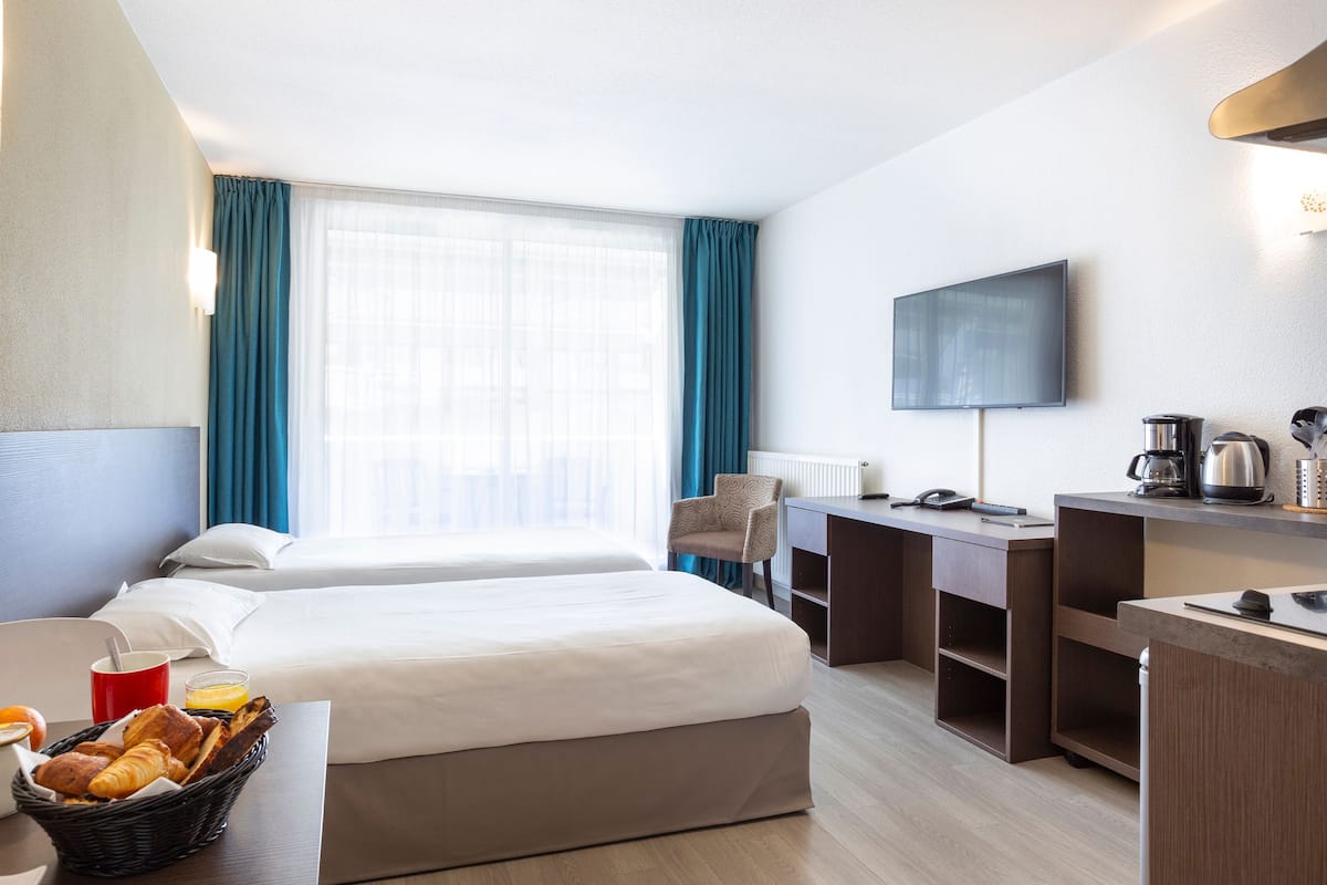 Studio | Premium bedding, in-room safe, blackout drapes, soundproofing