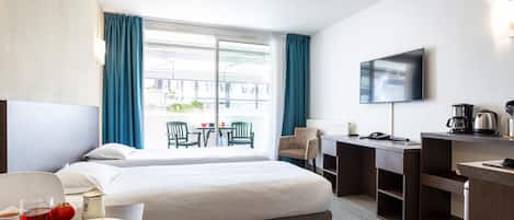 Estudio, Terraza | Ropa de cama de alta calidad y caja de seguridad en la habitación
