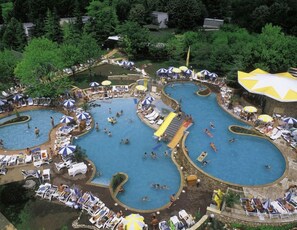 Seasonal outdoor pool, pool umbrellas, pool loungers