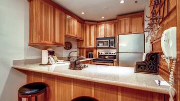 Condo, 2 Bedrooms | Private kitchen | Fridge, microwave, coffee/tea maker