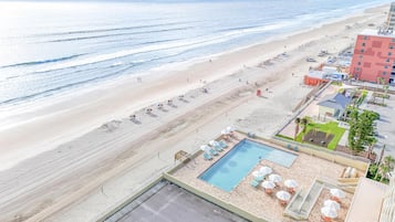 Outdoor pool, open 8:00 AM to 10:00 PM, pool umbrellas