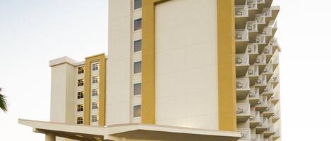 A multi-story hotel with a prominent "HYATT PLACE" sign on the facade.